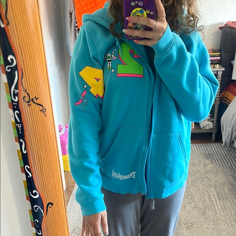 2024 Disney Blue Sweatshirt with Colorful Graphics - Picture 4 of 4